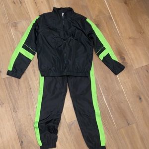 Black track suit with neon green strips